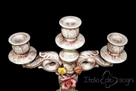 Candelabro con fiori